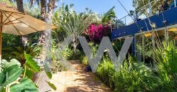 Majestoso Hotel com Jardim Tropical